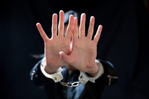 Raised Handcuffed Hands